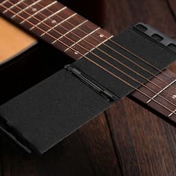 Gitaarsnarenreiniger - Snaarverzorging - Onderhoud Instrument - 360 graden reiniging - 11 x 6 x 4 cm - Zwart — thumbnail 2